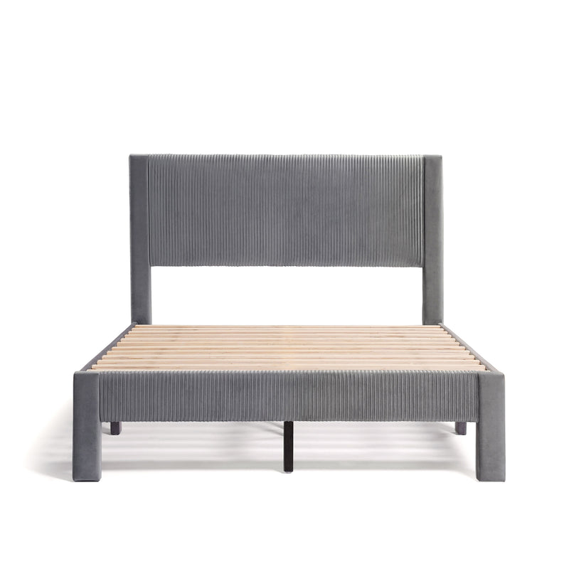Front facing modern gray velvet textured headboard full platform bed on a white background