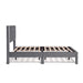 Front facing side view of a modern gray velvet textured headboard full platform bed on a white background