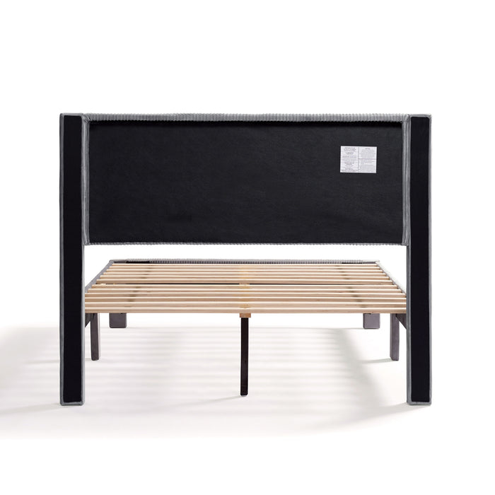 Front facing back view of a modern gray velvet textured headboard full platform bed on a white background