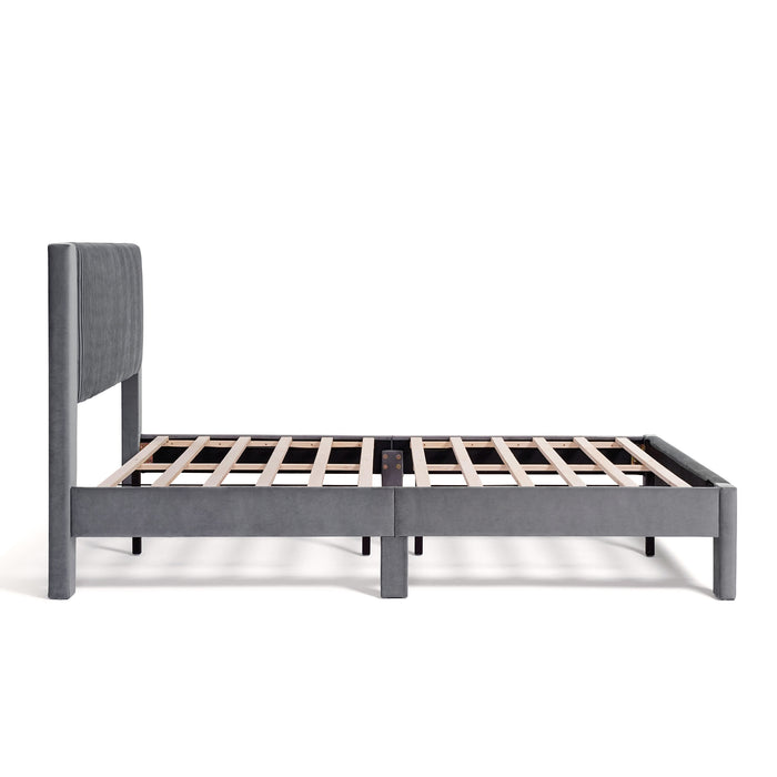 Front facing side view of a modern gray velvet textured headboard queen platform bed on a white background