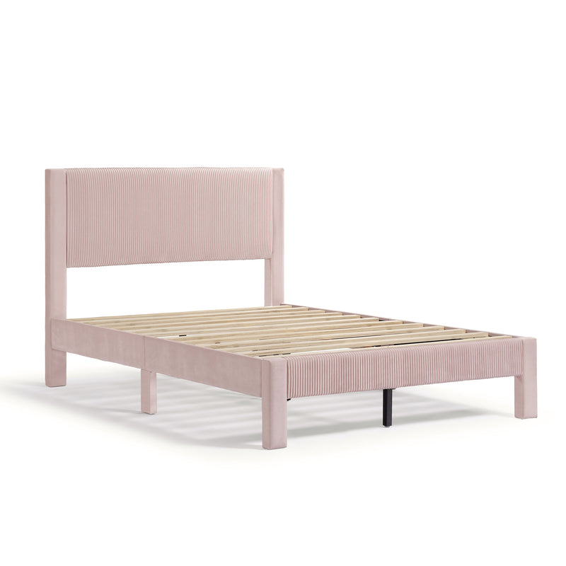 Right facing modern pink velvet textured headboard full platform bed on a white background