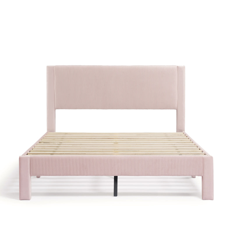 Front facing modern pink velvet textured headboard queen platform bed on a white background