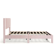Front facing side view of a modern pink velvet textured headboard queen platform bed on a white background