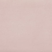 Close up swatch of the pink velvet upholstery featured on a modern pink velvet textured headboard queen platform bed