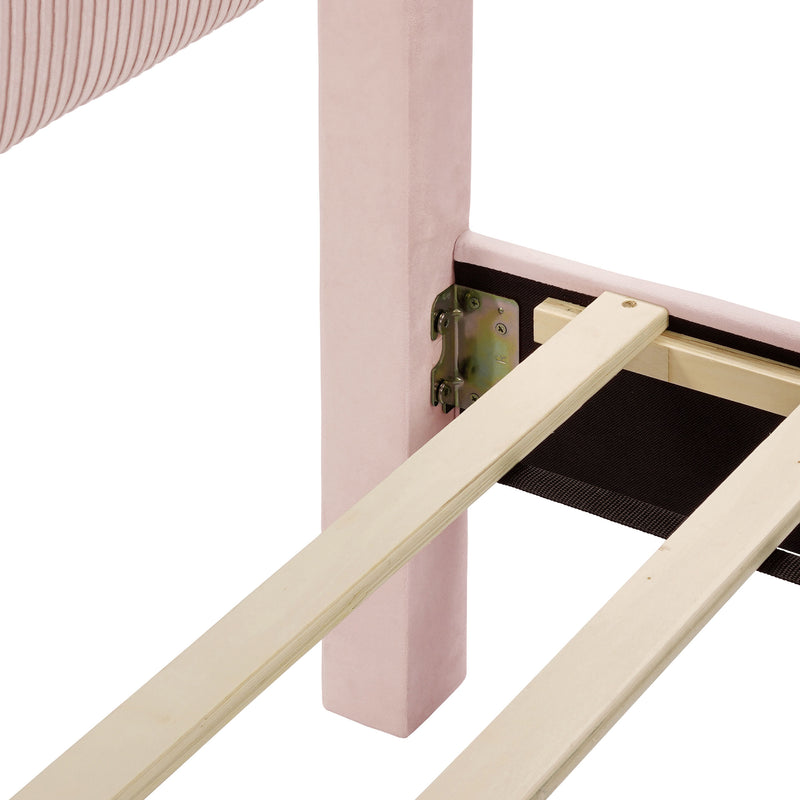 Right facing close up view of the headboard corner and slats on a modern pink velvet textured headboard queen platform bed on a white background