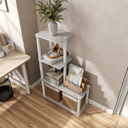 Left facing high-camera view of a four-shelf modular shelving unit with support rods in a room with accessories