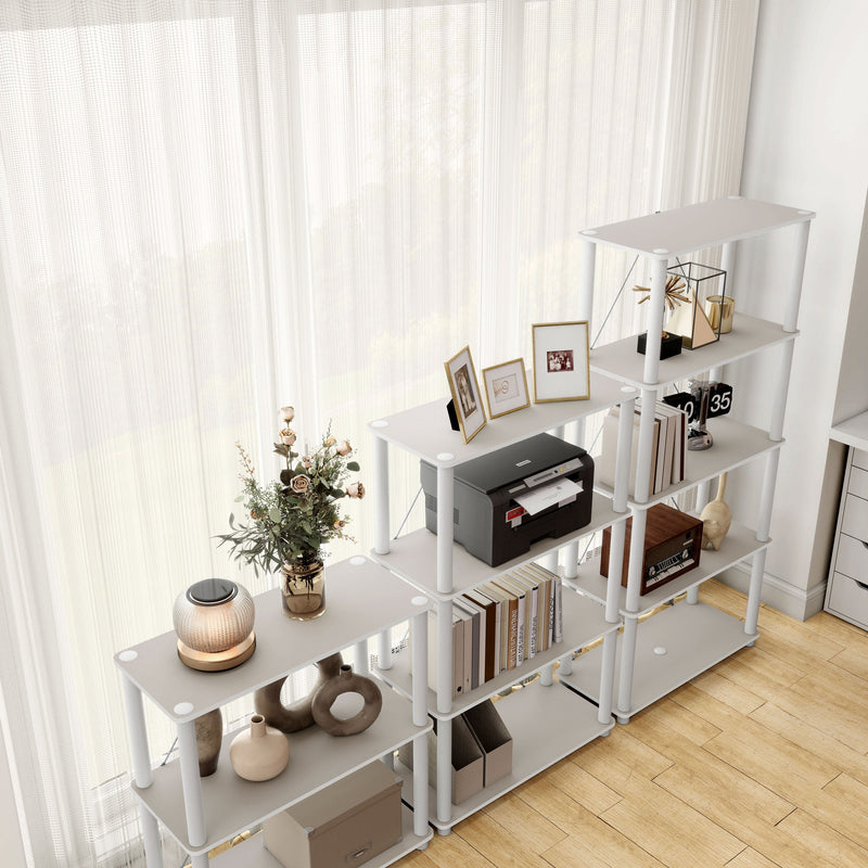 Right facing high-camera view of three various wide-shelf modular shelving unit with support rods in a room with accessories