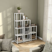 Right facing high-camera view of three shelf modular shelving units in a room with accessories
