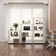 Front facing of three various wide-shelf modular shelving unit with support rods in a room with accessories