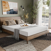 A bedroom with the 6-inch mattress on a bed frame, ready for use.