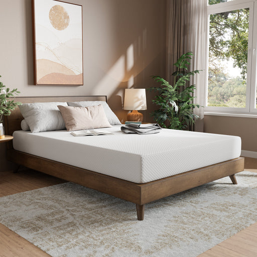 A bedroom with the 8-inch mattress on a bed frame, ready for use.