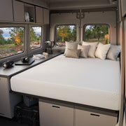 A camper van with the 8-inch mattress inside, showing its use for camping.