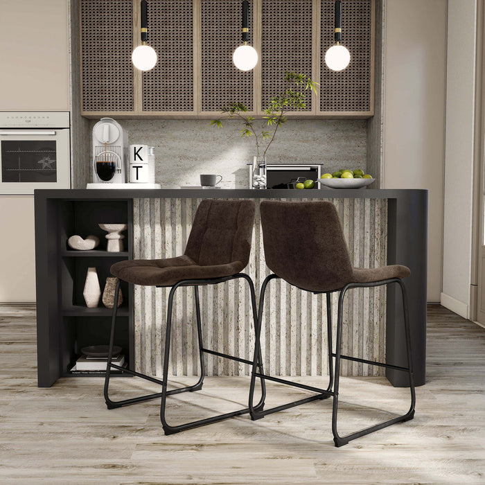 Angled set of two contemporary brown chenille counter height stools with black bases in a room with accessories