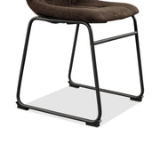 Right facing close up single view of the base on a set of two contemporary brown chenille dining side chairs with black bases on a white background