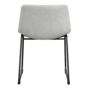 Front facing single back view of a set of two contemporary light grey chenille dining side chairs with black bases on a white background