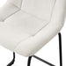 Left facing close up single view of a set of two contemporary white chenille counter height stools with black bases on a white background