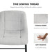 Informational image of the fine thread of a set of two contemporary white chenille counter height stools with black bases