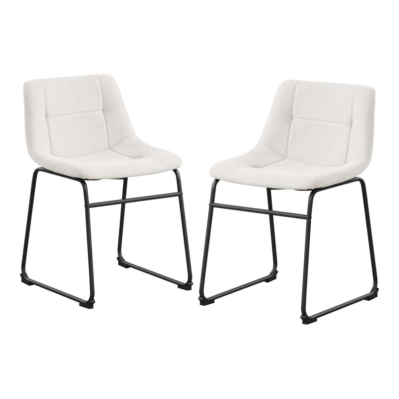 Angled set of two contemporary white chenille dining side chairs with black bases on a white background