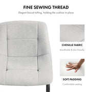 Informational image of the fine thread of a set of two contemporary white chenille dining side chairs with black bases