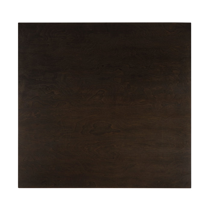 Front-facing top view of the tabletop featured in a five-piece traditional espresso wooden dining set with a table and four chairs on a white background