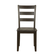 Front facing chair-only view of five-piece traditional espresso wooden dining set with a table and four chairs on a white background