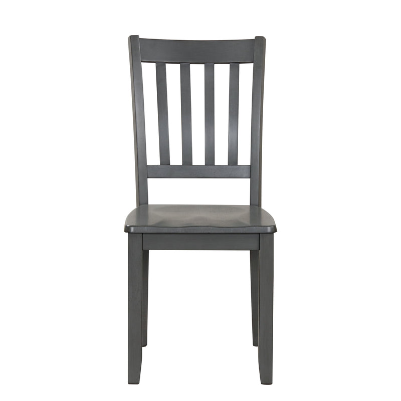 Front facing chair-only view of five-piece traditional grey wooden dining set with a table and four chairs on a white background