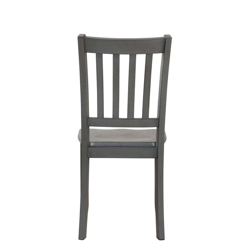 Front facing chair-only back view of five-piece traditional grey wooden dining set with a table and four chairs on a white background