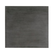 Front-facing top view of the tabletop featured in a five-piece traditional grey wooden dining set with a table and four chairs on a white background