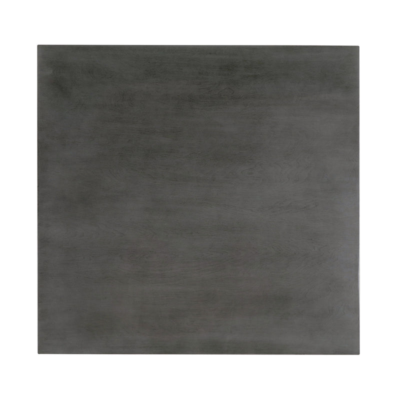 Front-facing top view of the tabletop featured in a five-piece traditional grey wooden dining set with a table and four chairs on a white background