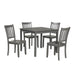Side facing five-piece traditional grey wooden dining set with a table and four chairs on a white background