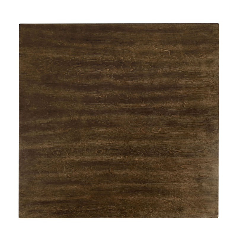 Front-facing top view of the tabletop featured in a five-piece traditional walnut wooden dining set with a table and four chairs on a white background