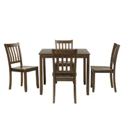 Front facing five-piece traditional walnut wooden dining set with a table and four chairs on a white background
