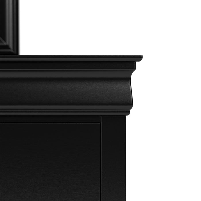 Front facing close up of a traditional black finish solid wood two-drawer nightstand showing its molded trim, on a white background
