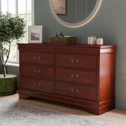 Left facing traditional cherry finish solid wood six-drawer dresser in a room with accessories