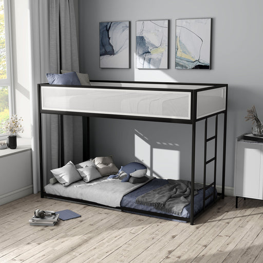 Left facing contemporary black metal twin-over-twin bunk bed with wire mesh upper guardrails in a bedroom with accessories