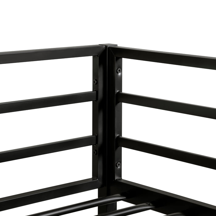 Close up view of the guardrail of a contemporary black metal twin-over-full bunk bed on a white background