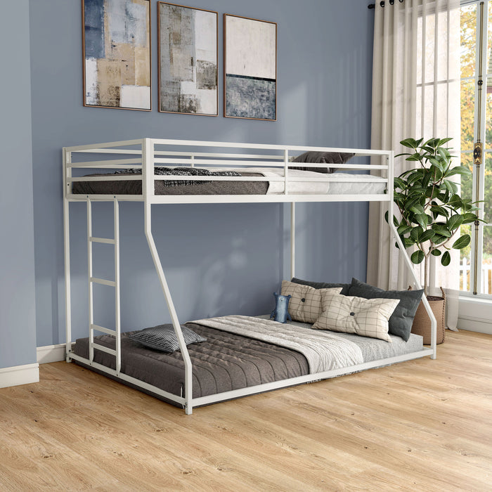 Right facing contemporary white metal twin-over-full bunk bed in a bedroom with accessories