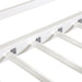 Close up view of the guardrail and slats of a contemporary white metal twin-over-full bunk bed on a white background