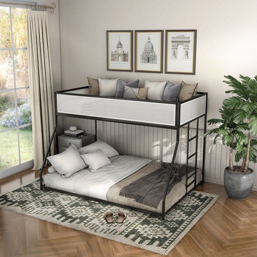 Left facing contemporary black metal twin-over-full bunk bed with wire mesh upper guardrails in a bedroom with accessories