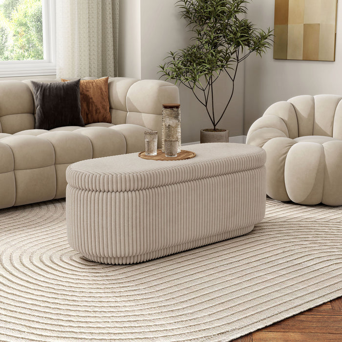 Right facing modern tufted beige pink chenille oval storage bench in a room with accessories