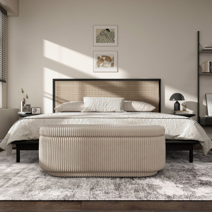 Front facing modern tufted beige pink chenille oval storage bench in a room with accessories