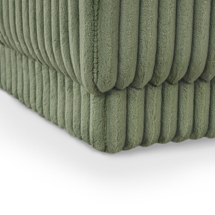 Right facing close up of a modern tufted green chenille rectangular storage bench on a white background
