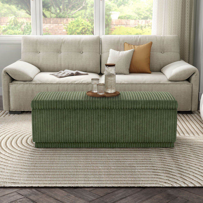 Front facing modern tufted green chenille rectangular storage bench in a room with accessories