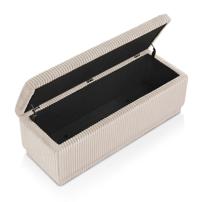 Right facing bird's eye view of a modern tufted beige pink chenille rectangular storage bench with top lifted on a white background