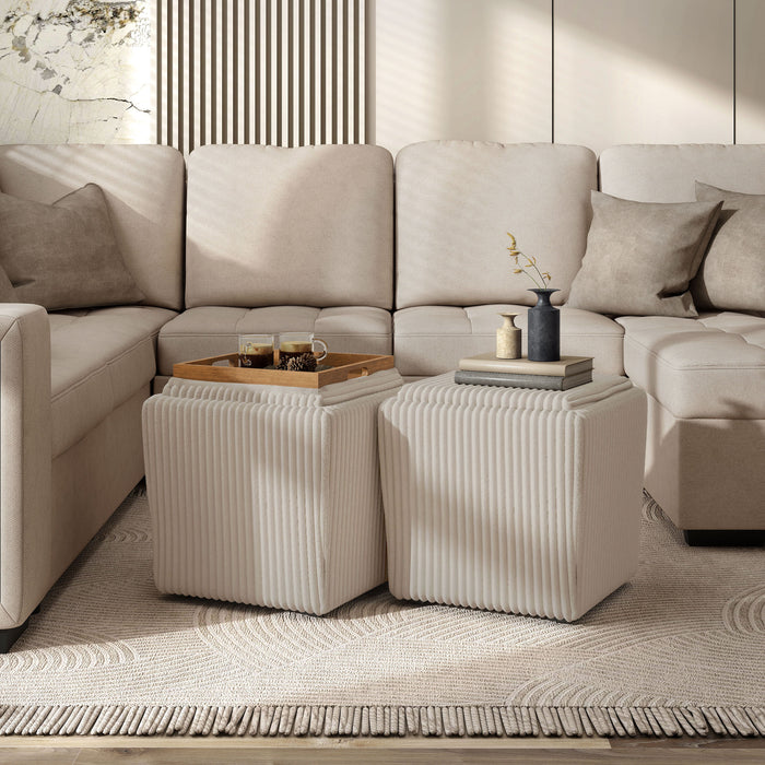 Left facing modern tufted beige pink chenille storage ottoman with a reversible tray top in a room with accessories