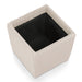 Right facing modern tufted beige pink chenille storage ottoman with a reversible tray top removed on a white background
