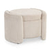 Right facing modern tufted beige pink chenille round storage ottoman with a flip top on a white background