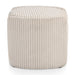Front facing side view of a modern tufted beige pink chenille round storage ottoman with a flip top on a white background