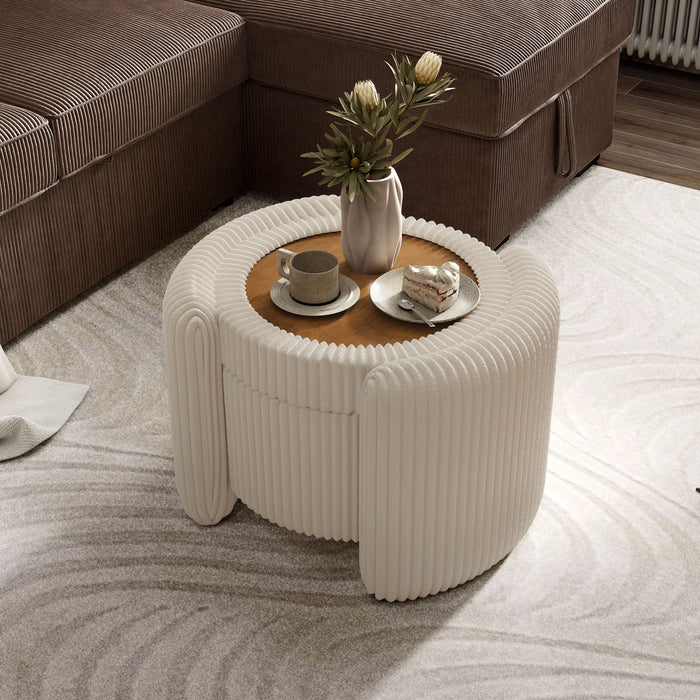 Left facing bird's eye view of a modern tufted beige pink chenille round storage ottoman with a flip top in a room with accessories