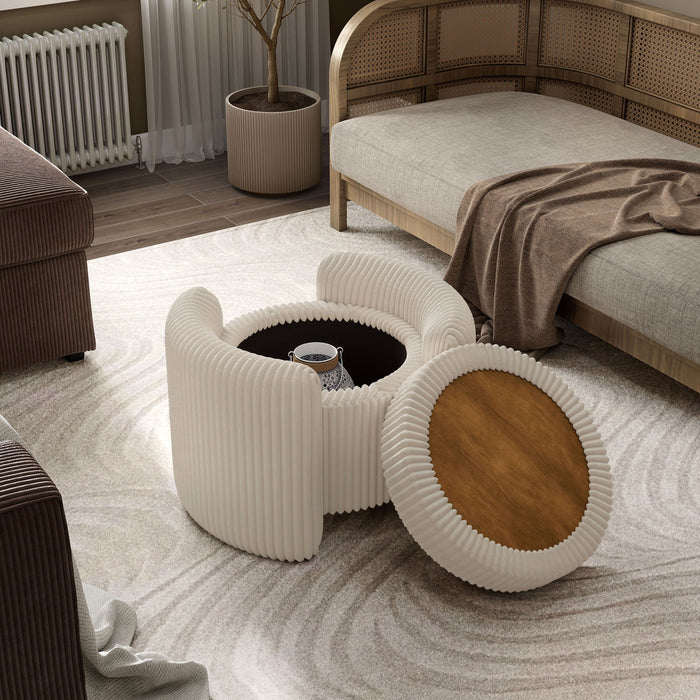 Left facing bird's eye view of a modern tufted beige pink chenille round storage ottoman with a flip top removed in a room with accessories